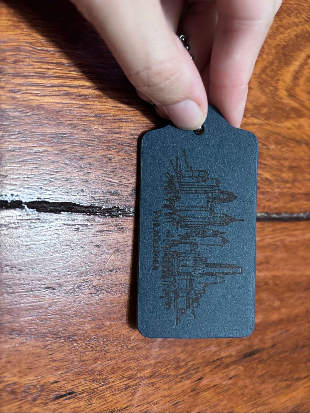Coach blue Philadelphia keychain